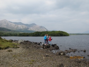 Elisha, Livia and I in front of the mountains and lake